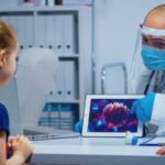 Doctor explaining to child